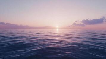 Calm ocean waters reflect the soft hues of a sunset sky, creating a serene and picturesque seascape at twilight. photo