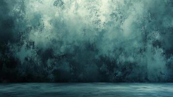 Dramatic background featuring a textured wall and floor in muted teal and dark blue tones, creating a moody and artistic atmosphere. photo