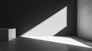 Minimalist studio with contrast of light and shadow creating stark geometric shapes. A simple cube sits on a stark reflective floor. photo
