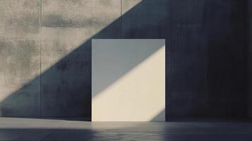 Minimalist scene featuring a rectangular object against a concrete wall, illuminated by a strong diagonal beam of sunlight. photo