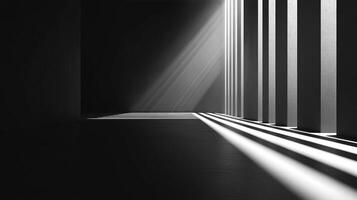 Striking monochrome image featuring strong beams of light shining through architectural pillars, creating a dramatic play of shadow and brightness. photo