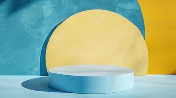 Minimalist stage with geometric forms in a sunlit room, ideal for presenting products with its vibrant, color-blocked backdrop. photo