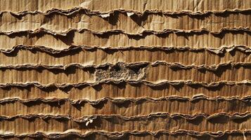 Detailed view of corrugated cardboard, showing texture, shadows, and a damaged area. Brown material creates a unique background. photo