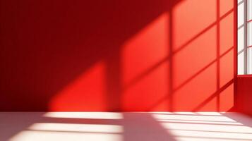 Interior featuring a saturated red wall with sunlight streaming in from the window, creating geometric shadows on the wall and floor. photo