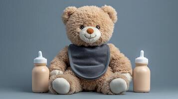 A teddy bear with a bib and bottles photo