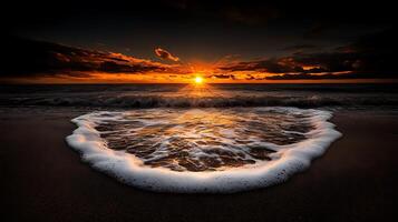 A heart shaped wave on the beach at sunset photo