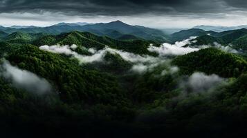 A view of the mountains and clouds from above photo
