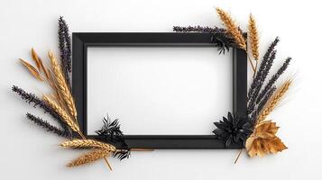 Black frame with wheat and flowers on a white background photo