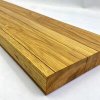 beautiful teak wood planks with smooth texture and natural grain pattern, isolated on a clean white background for a minimalist look photo
