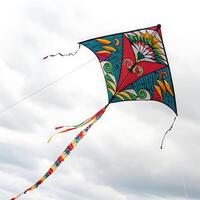 Beautiful kite in bold colors and patterns, flying gracefully in the wind with colorful tails fluttering against a serene sky photo