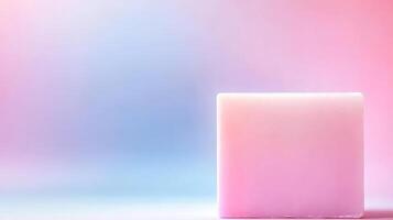 Pink bar of soap on gradient color backdrop photo