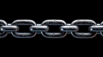 Metal chain links close up on black photo