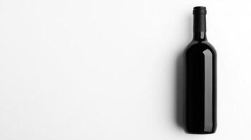 Elegant black wine bottle on a clean white surface photo