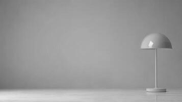 Elegant minimalist lamp on a smooth white surface in a modern setting photo