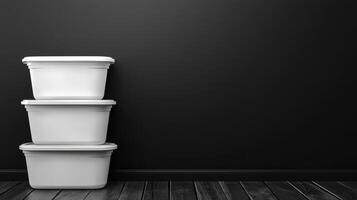 Stacked storage containers against a minimalist dark background photo