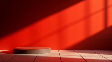 Vibrant red wall bathed in sunlight with raised circular platform photo