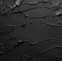 Texture of cracked black surface creates an abstract visual impact photo