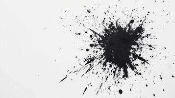 Bold black paint splatter creating a dramatic abstract effect photo