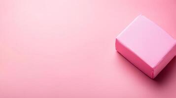 Bright pink package resting on a pastel surface inviting curiosity photo