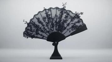 Elegant black lace fan with floral patterns and artful design photo