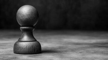 Artistic representation of a lone chess piece on textured surface photo