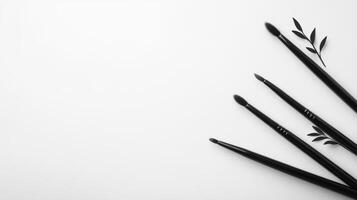 Artistic brush arrangement with nature inspired accents on canvas photo