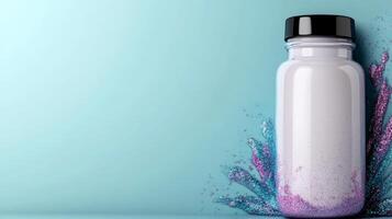 Colorful powder bursting from a white bottle against a blue backdrop photo