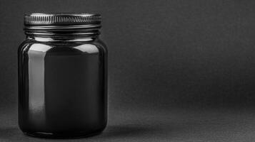 Crafting with a sleek black jar showcasing creativity and design photo
