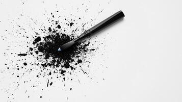 Creative expression through splattered ink on a blank canvas photo