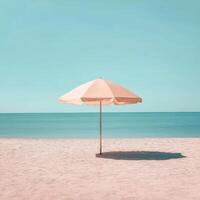 Peaceful beach umbrella under a clear blue sky photo