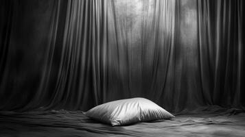 Soft pillow resting on draped fabric under soft light photo