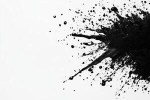 Black paint splatter on white surface creates artistic contrast photo