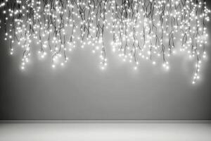 Delicate string lights illuminating a minimalist gray backdrop photo