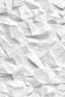 Crumpled white paper texture with intricate folds and creases photo