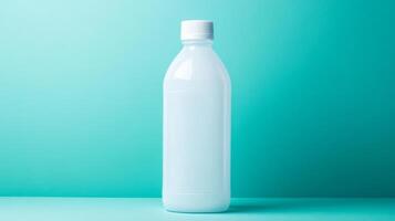 Milk bottle on a turquoise background with solid colors photo