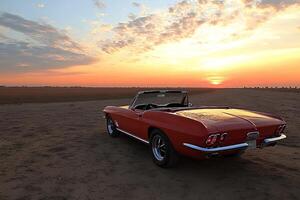 A classic American car parked on the beach, with the warm glow of the sunset casting a golden hue over the scene photo