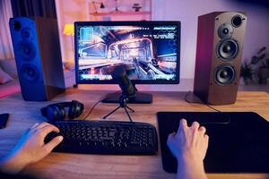 A person is playing a game on a computer photo