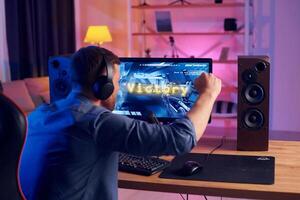A man playing games on a computer photo