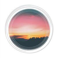 A circular photo of a sunset with a mountain in the background