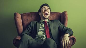 A man in a suit and tie is laughing photo