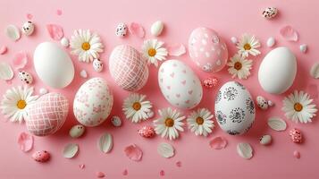 Elegant Easter eggs with floral and heart patterns on a soft pink background, spring festive composition photo