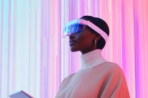 Stylish individual wearing augmented reality glasses in a vibrant illuminated space during the evening photo