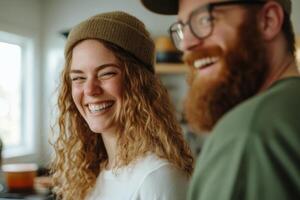 Friends enjoying a joyful moment in a cozy kitchen while preparing a meal and laughing together photo