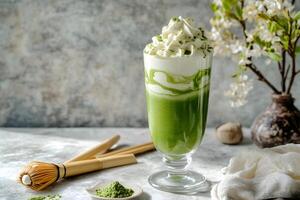 Layered matcha green tea smoothie with swirl effect in a tall glass for a visually striking and refreshing drink photo