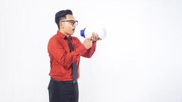 Side View of Handsome Asian Male Office Worker Business Man in Formal Outfit Shouting on Megaphone on White Background photo
