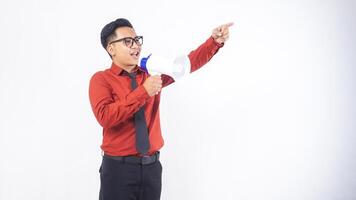 Young Adult Asian Male Office Worker Business Man Wearing Formal Outfit Shouting on Megaphone on White Background photo