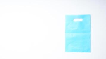 Blank Light Blue Plastic Bag Mock Up on White Background photo