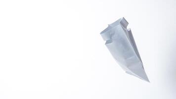 Side View of Open Gray Plastic Bag on White Background photo