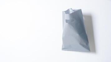 Open Blank Gray Plastic Bag Mock Up on White Background photo