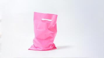 Open Used Pink Plastic Bag Mock Up with Handle on White Background photo